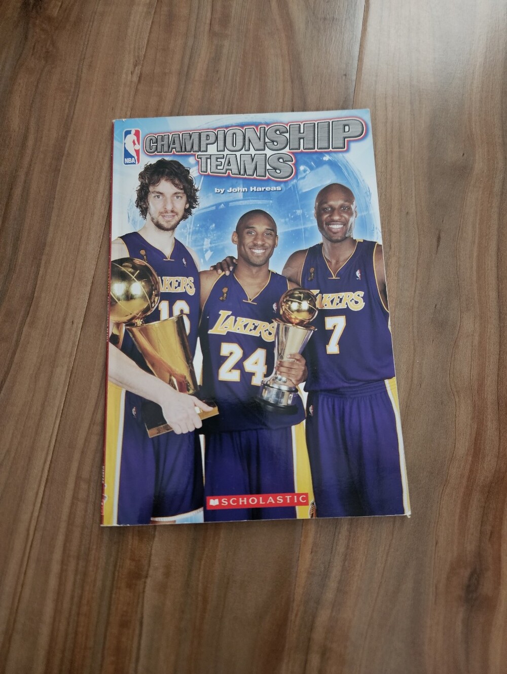 Scholastic Lakers Championship Teams Book - Blue & Orange Cover